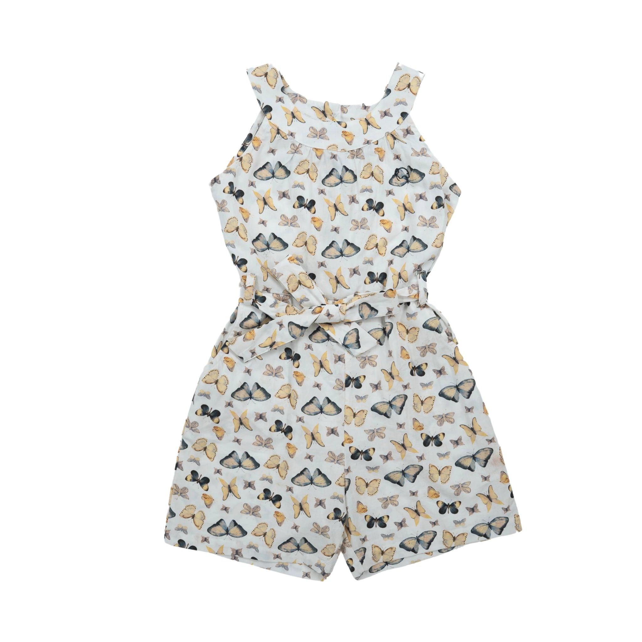 Adventure-ready Blue Surf play suit with a butterfly print and a tie waist, isolated on a white background by Karee.