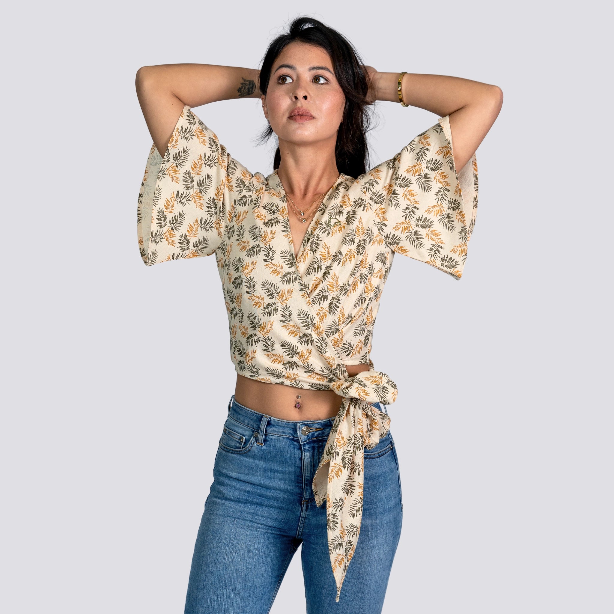 A woman wearing a Stylish Linen Wrap Top . Women's clothing UK, Women's top