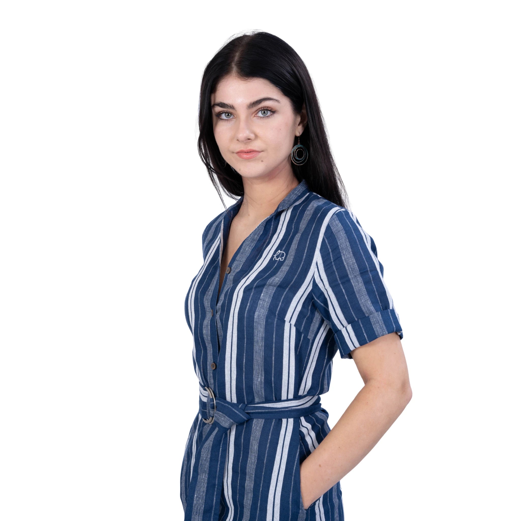 A woman wearing a sustainable linen shirt dress from Karee, she is wearing it to office, Office wear for women, She has her hands in the pocket, Comfortable outfit