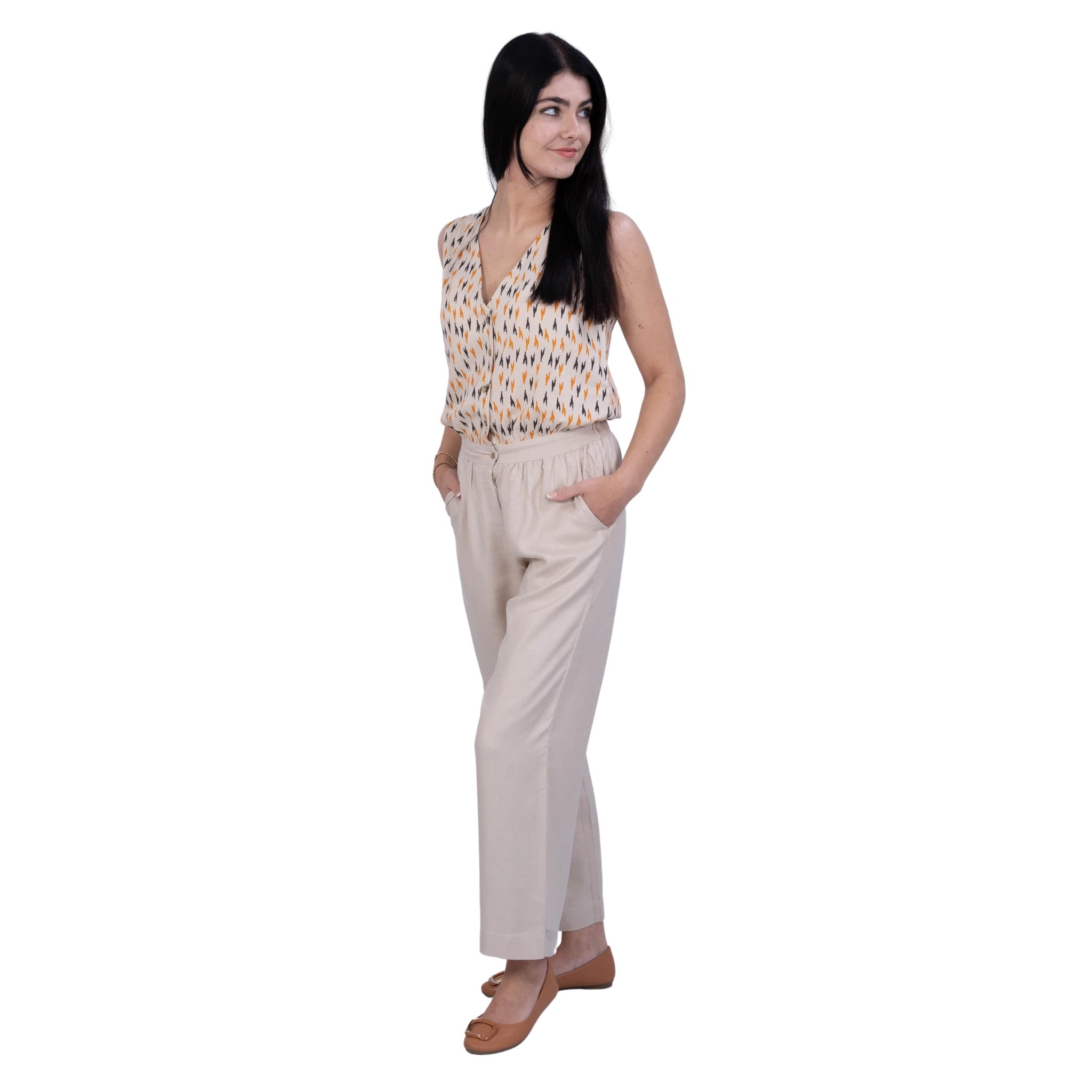 A woman wearing a beige jumpsuit, sleeveless jumpsuit with pockets, Jumpsuit with wooden buttons. stylish office jumpsuit