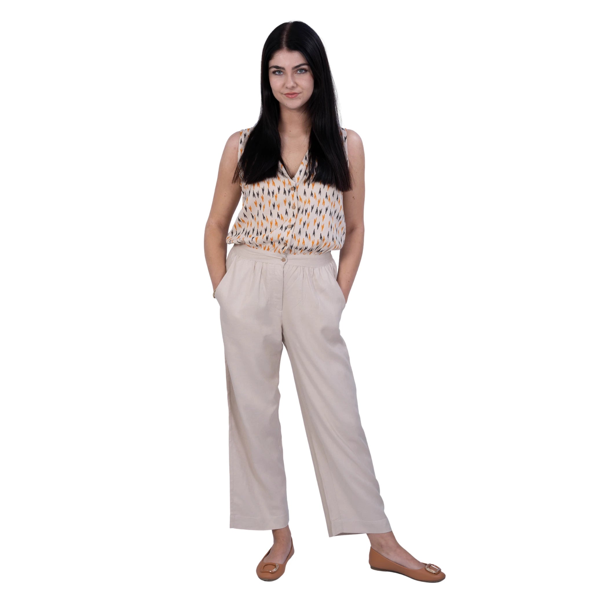 A woman wearing a linen jumpsuit, sustainable fashion, Affordable fashion for woman. Stylish and comfortable jumpsuit, sleeveless jumpsuit for woman