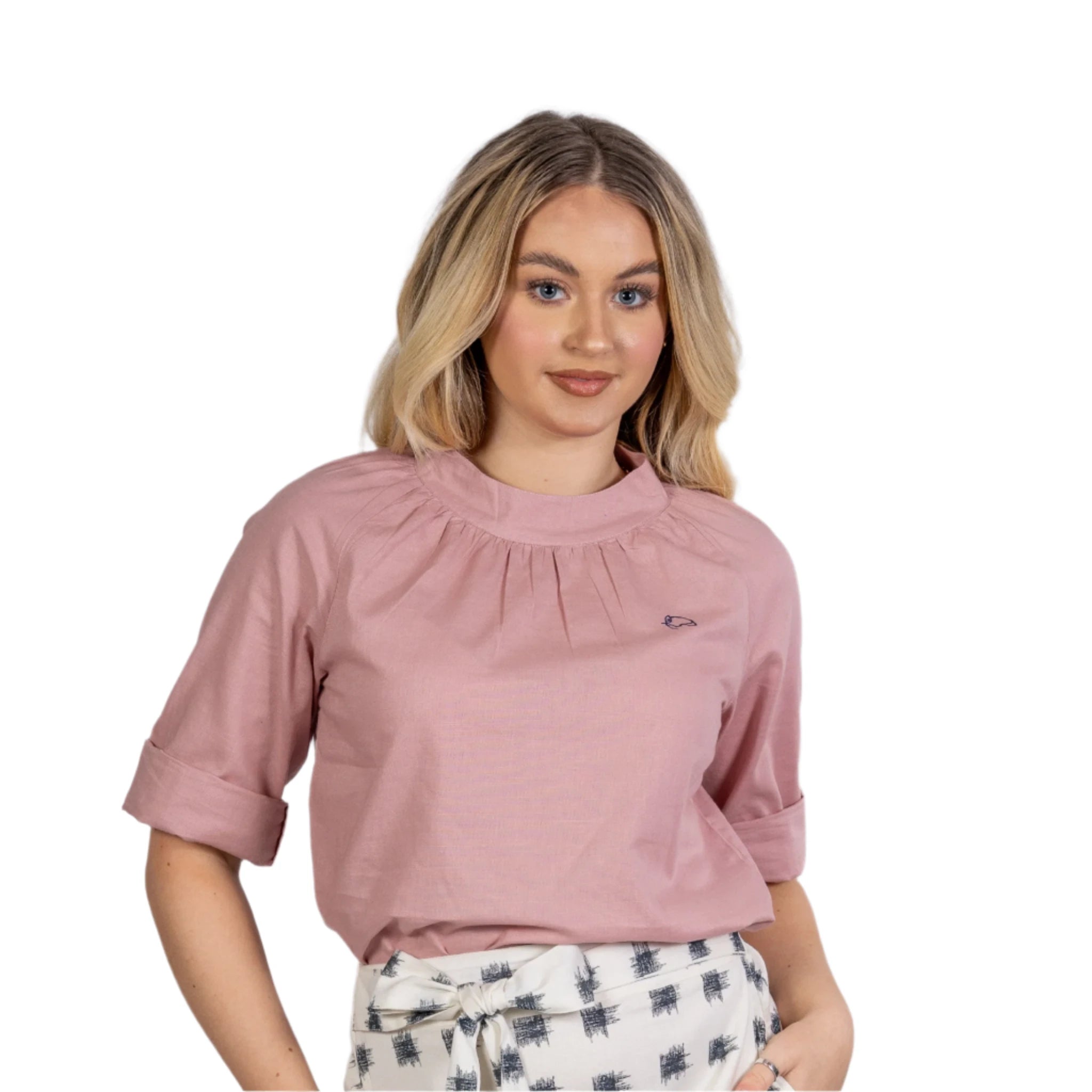 A woman wearing a Stylish Pink Top. Linen office wear for Women